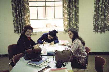 Ruth Dayhoff (right) studying with medical school classmates Yolanda Stassinopoulos (left) and Alice Duong(middle) in the cafeteria at Georgetown University Medical School, 1974