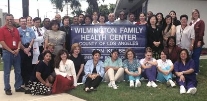 Michelle Bholat with the Wilmington Family Health Center staff, 1999