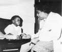 Ethel D. Allen with a young child
