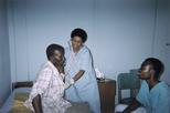 G. Valerie Beckles-Neblett examining a patient at a Haiti Mission, ca. 2000