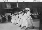 May Edward Chinn (second from right) marching in a suffrage parade on 5th Avenue, 1919
