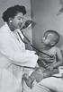 Grace Marilynn James with a young patient