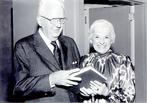 Edithe J. Levit with co-author John P. Hubbard holding their book on the National Board of Medical Examiners, 1985