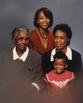Joan Y. Reede with her daughter Loretta Jackson, mother Tommye Reede and grandmother Alice Bacon, ca. 1989