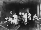 Florence Sabin (seated, middle table) teaching anatomy, Johns Hopkins University School of Medicine, early 1900s