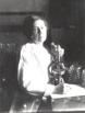 Anna Wessels Williams at her microscope in the early 1900's